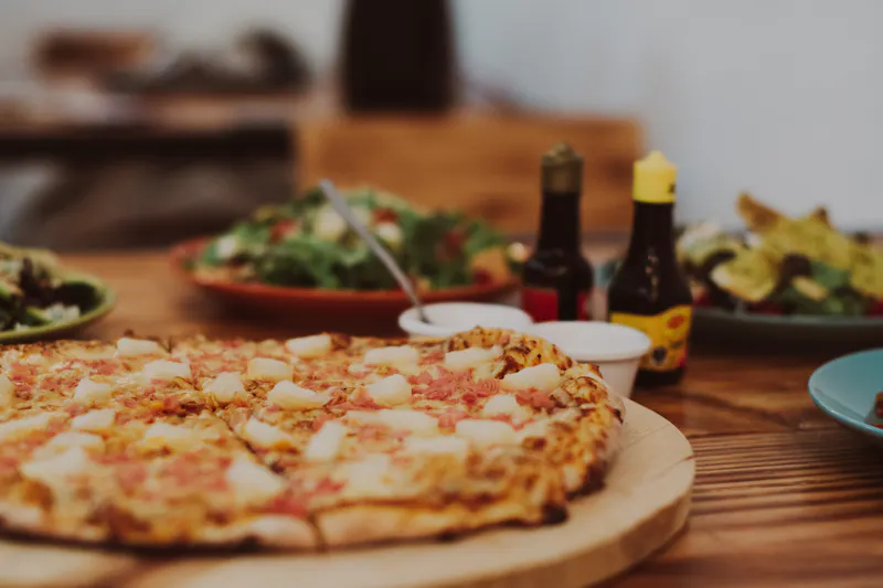 Hawaiian pizza with pineapple and ham